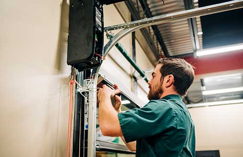 Technician Installing Opener